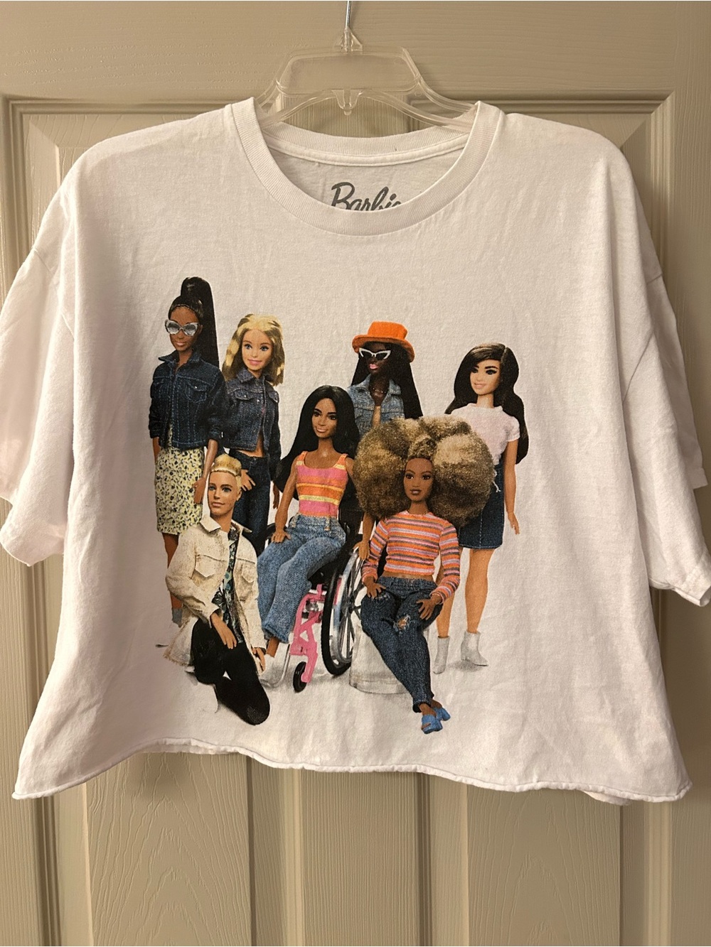 Barbie White Short Sleeve Tee with Multicolor Dolls Graphic